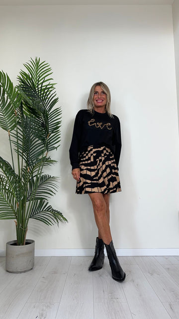 DAFNE - ZS8040P19 - GONNA CORTA IN MAGLIA DI VISCOSA SVASATA FANTASIA ASTRATTA